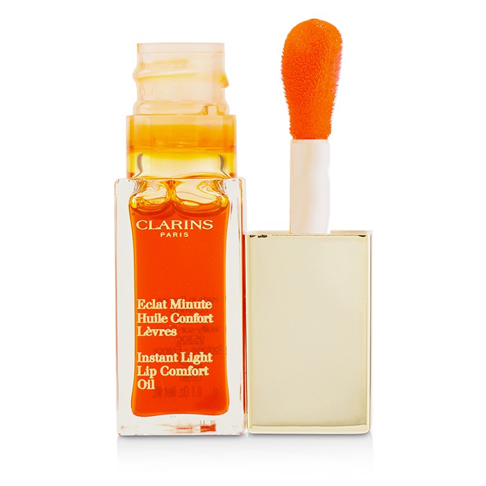 Clarins eclat minute lip comfort. Clarins Lip Comfort Oil Tangerine. Clarins Eclat minute instant Light Lip Comfort Oil. 05 Tangerine Clarins. Clarins instant Light Lip Comfort Oil Tangerine.