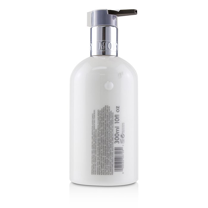Molton Brown Serene Coco & Sandalwood Body Lotion 300ml/10ozProduct Thumbnail