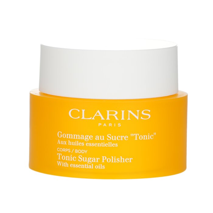 Тоник сахар. Clarins Gommage Tonic Corps. Кларанс гоммаж для тела. Кларинс желтый пилинг. Tenseur Toning Clarins.