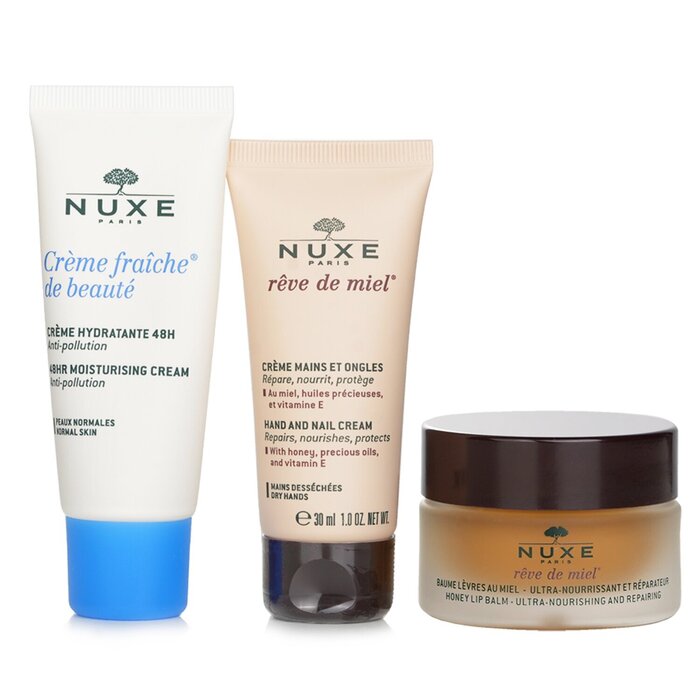 Nuxe Moisture Me Набор: Creme Fraiche De Beaute 48Hr Увлажняющий Крем 30мл + Reve De Miel Honey Бальзам для Губ 15г + Reve De Miel Крем для Рук и Ногтей 30мл 3pcsProduct Thumbnail