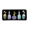 Anna Sui Miniature Coffret: Fantasia EDT 5ml + Fantasia Mermaid EDT 5ml + Secret Wish EDT 5ml + Lucky Wish EDT 5ml + La Vie De Boheme EDT 4ml + Pouch 5pcs+Pouch